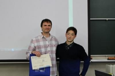 Best participant award 受賞者　池間大輔さんと Prof. Wirz 