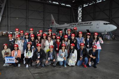 Take a photo with an airplane in the hangar