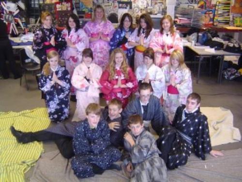 Excited middle school students in yukata