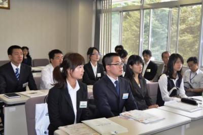 Freshmen listening intently to briefings