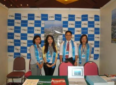 "Study in Japan Fair", Hanoi. From left: Ms. Zan (interpreter), Ms. Yamamoto (staff), Hasegawa (associate professor), Ms. Ran (interpreter)