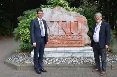 Commemorative Photo in Front of YNU Monument. Rector Niinimäki (Left) and Prof. Kohno