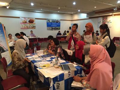 A local Indonesian interpreter responding to visitors’ questions