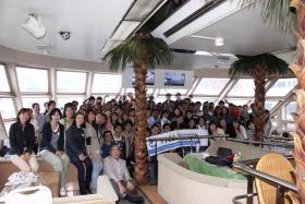 “Smile!” on the stage of View Seat inside Marine Shuttle 